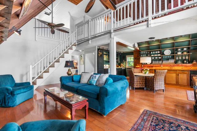 a outdoor dining area with furniture and outdoor view