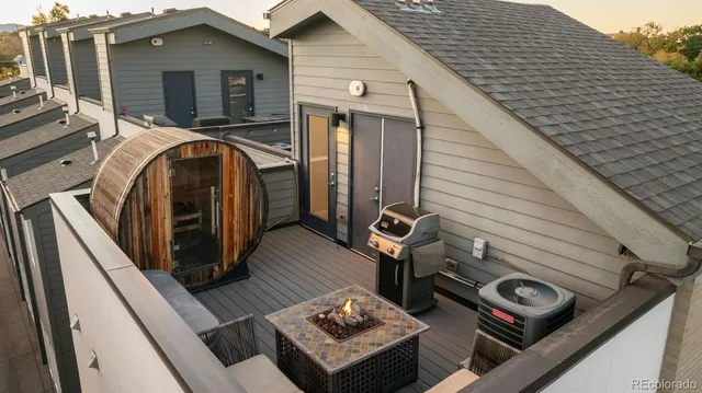 a view of a wooden deck with a bench