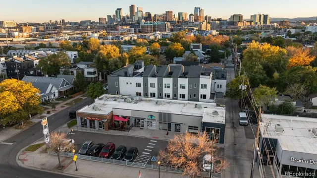 a view of a city with tall buildings