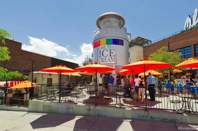 a view of a house with wooden fence