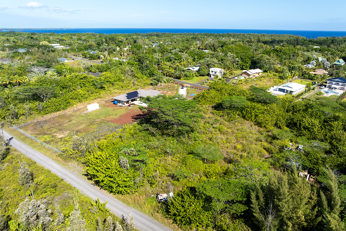 15-1576 Lot 3077 Beach Road Keaau, HI 96749 - Photo 16 of 23 a view of a yard with an ocean
