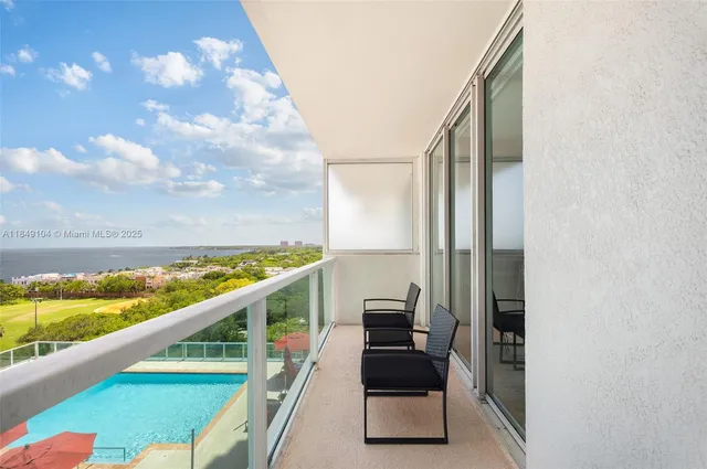 a view of balcony with furniture