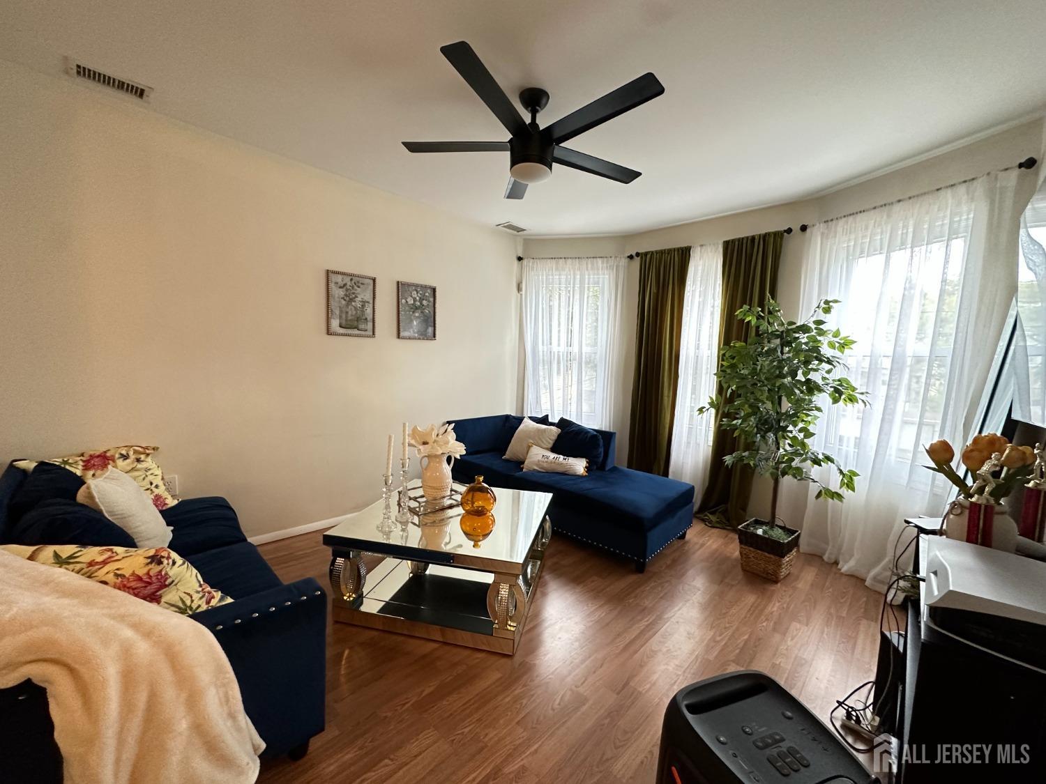 74 State Street Perth Amboy, NJ 08861 - Photo 3 of 9 a living room with furniture