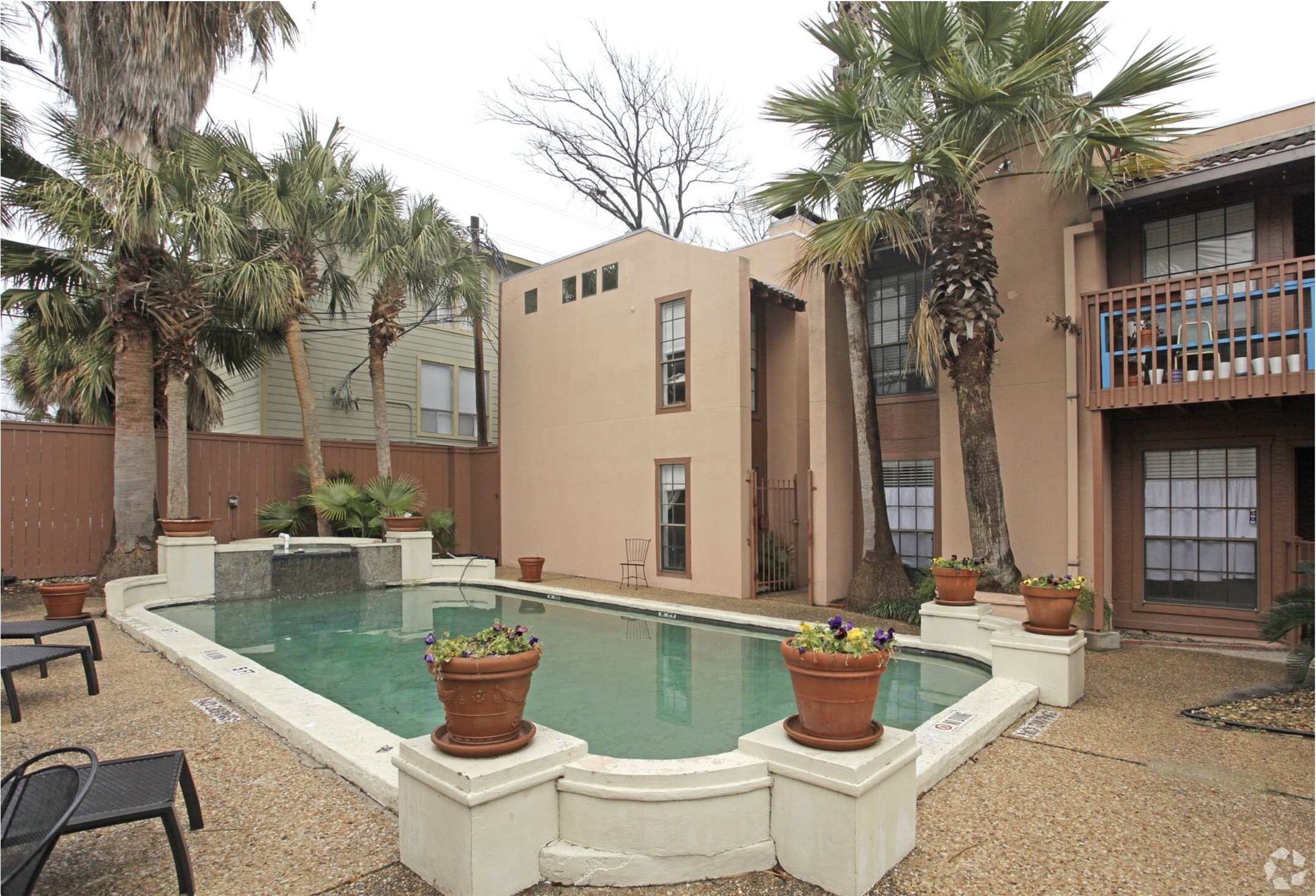 110 East 37th Street, Unit 111 Austin, TX 78705 - Photo 11 of 12 a front view of a house with outdoor seating