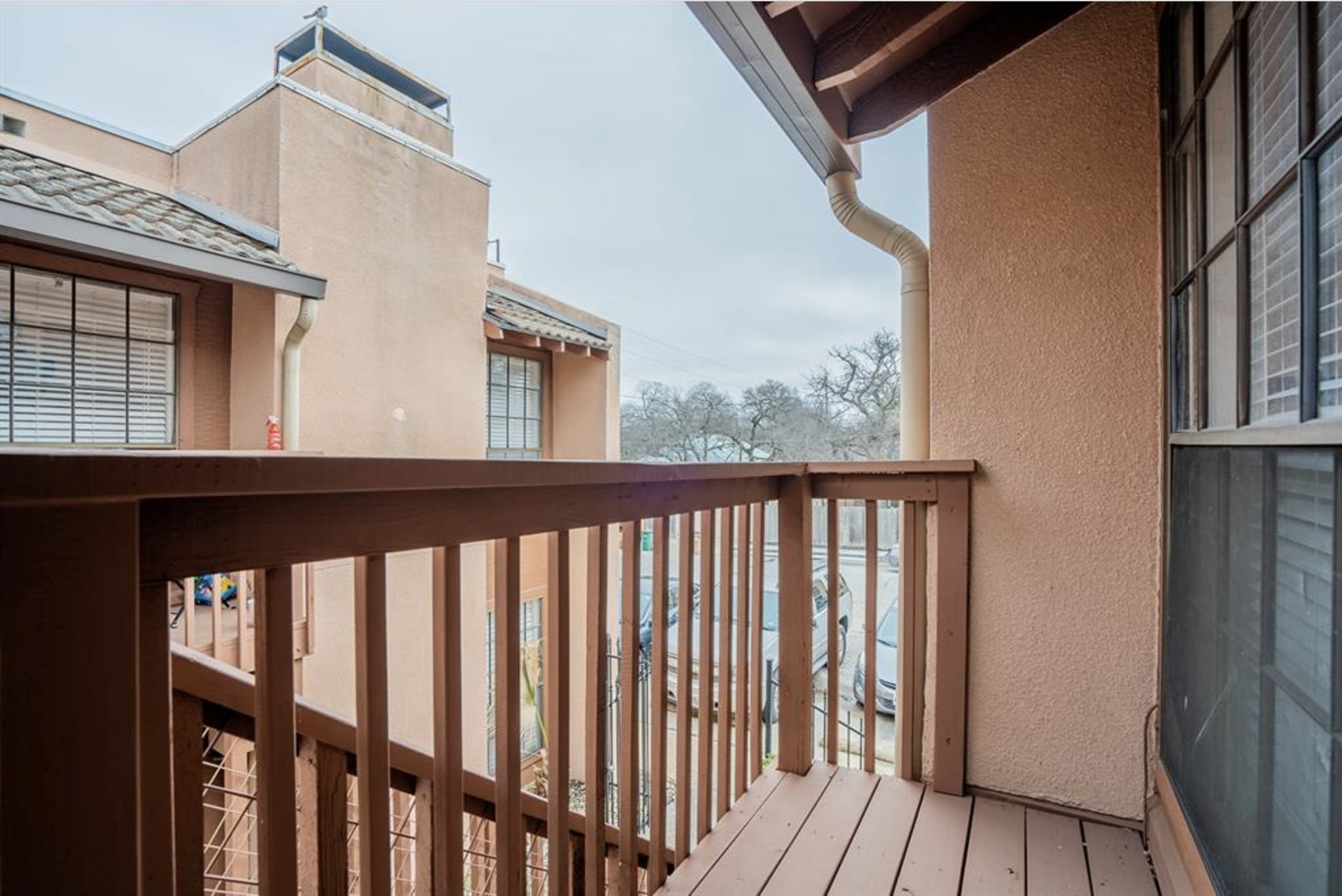 110 East 37th Street, Unit 111 Austin, TX 78705 - Photo 9 of 12 a view of a house with wooden floor