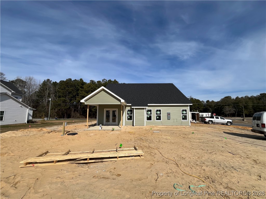 2118 Smith Road Hope Mills, NC 28348 - Photo 2 of 14 a front view of a house with a yard