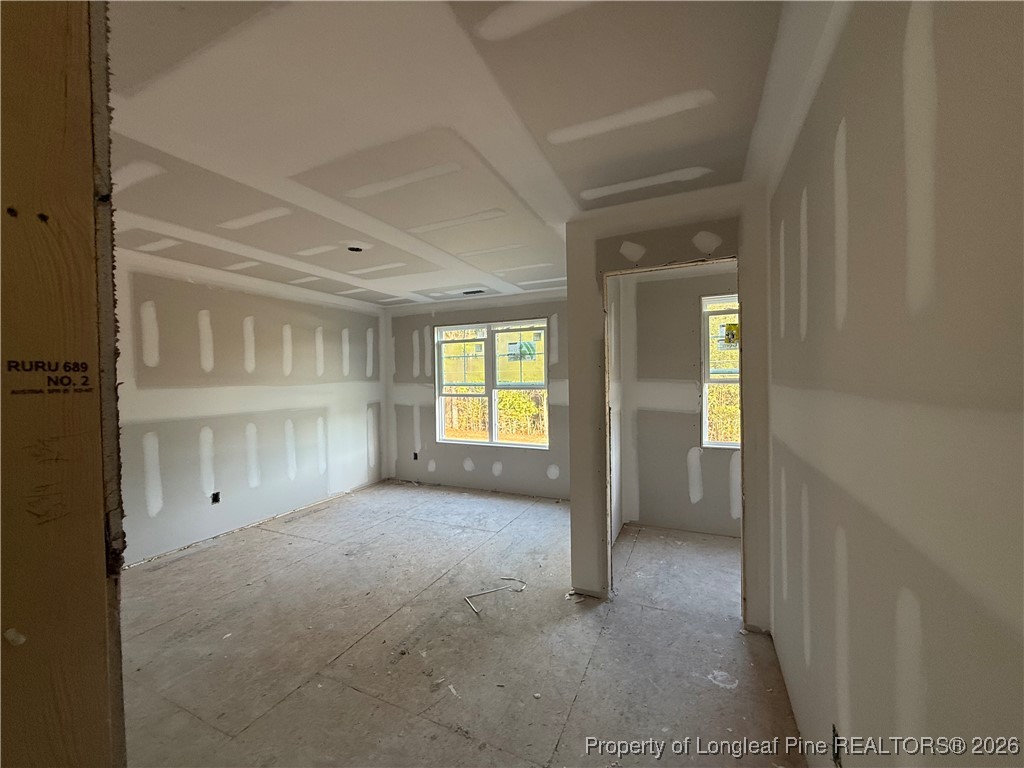 2118 Smith Road Hope Mills, NC 28348 - Photo 6 of 14 a view of an empty room with a window