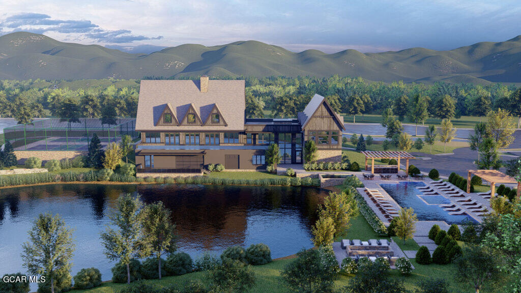 Undisclosed Address Winter Park, CO 80482 - Photo 41 of 52 an aerial view of house with yard swimming pool and mountains