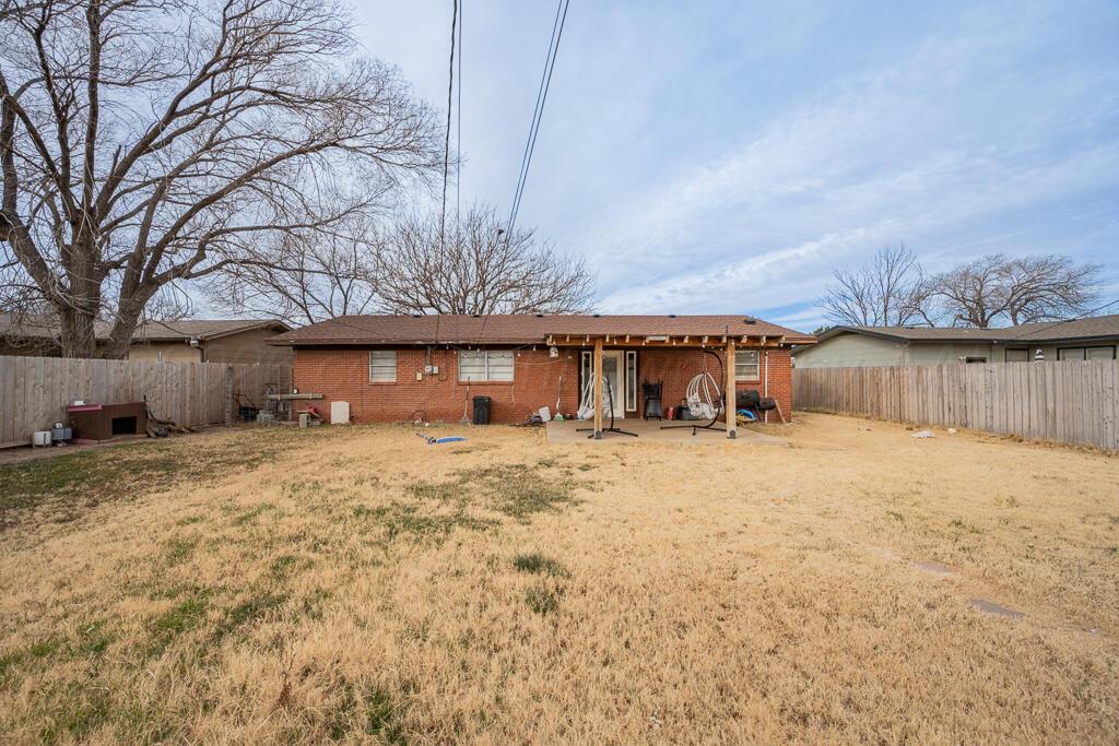 4613 South Bryan Street Amarillo, TX 79110 - Photo 16 of 16 a view of a house with a snow in the yard