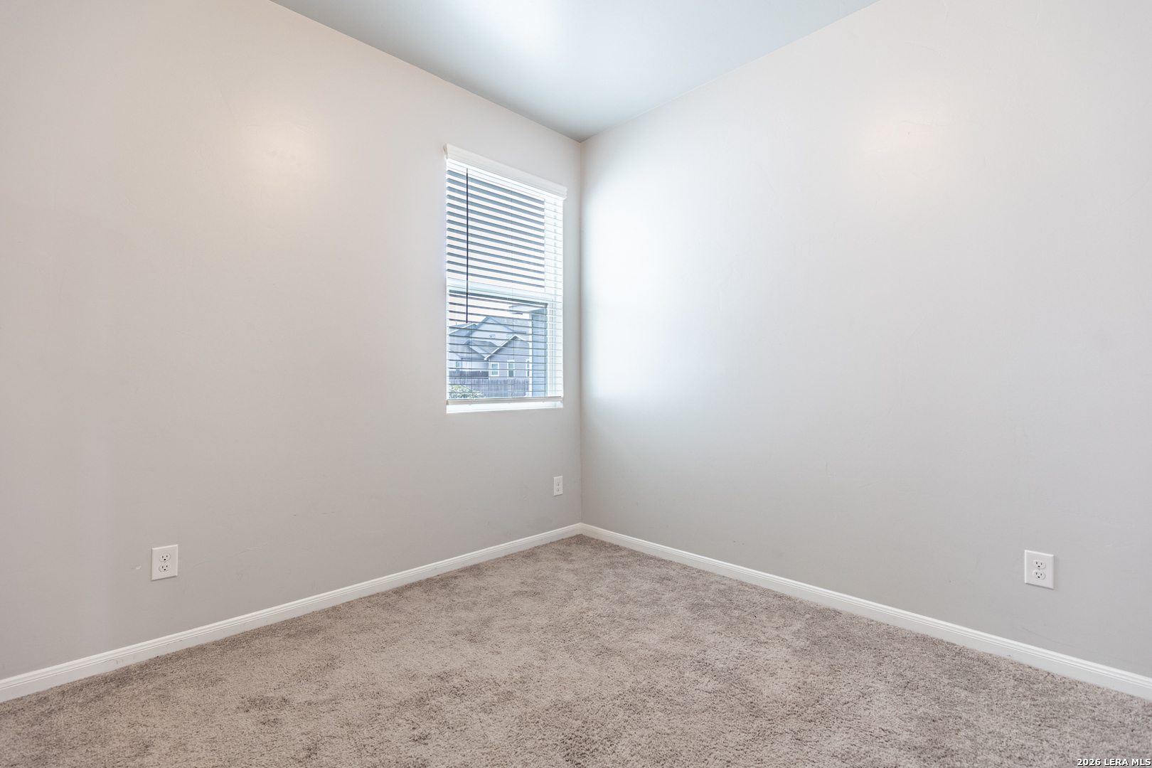 3923 Ivy Path St. Hedwig, TX 78152 - Photo 15 of 32 an empty room with windows