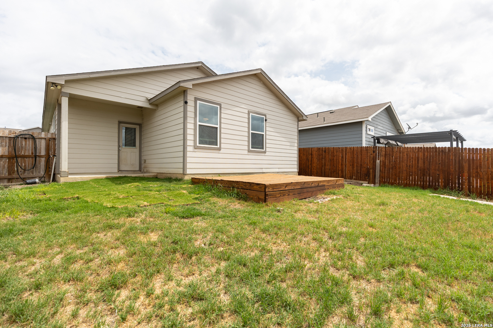 3923 Ivy Path St. Hedwig, TX 78152 - Photo 29 of 32 a view of a backyard with a garden