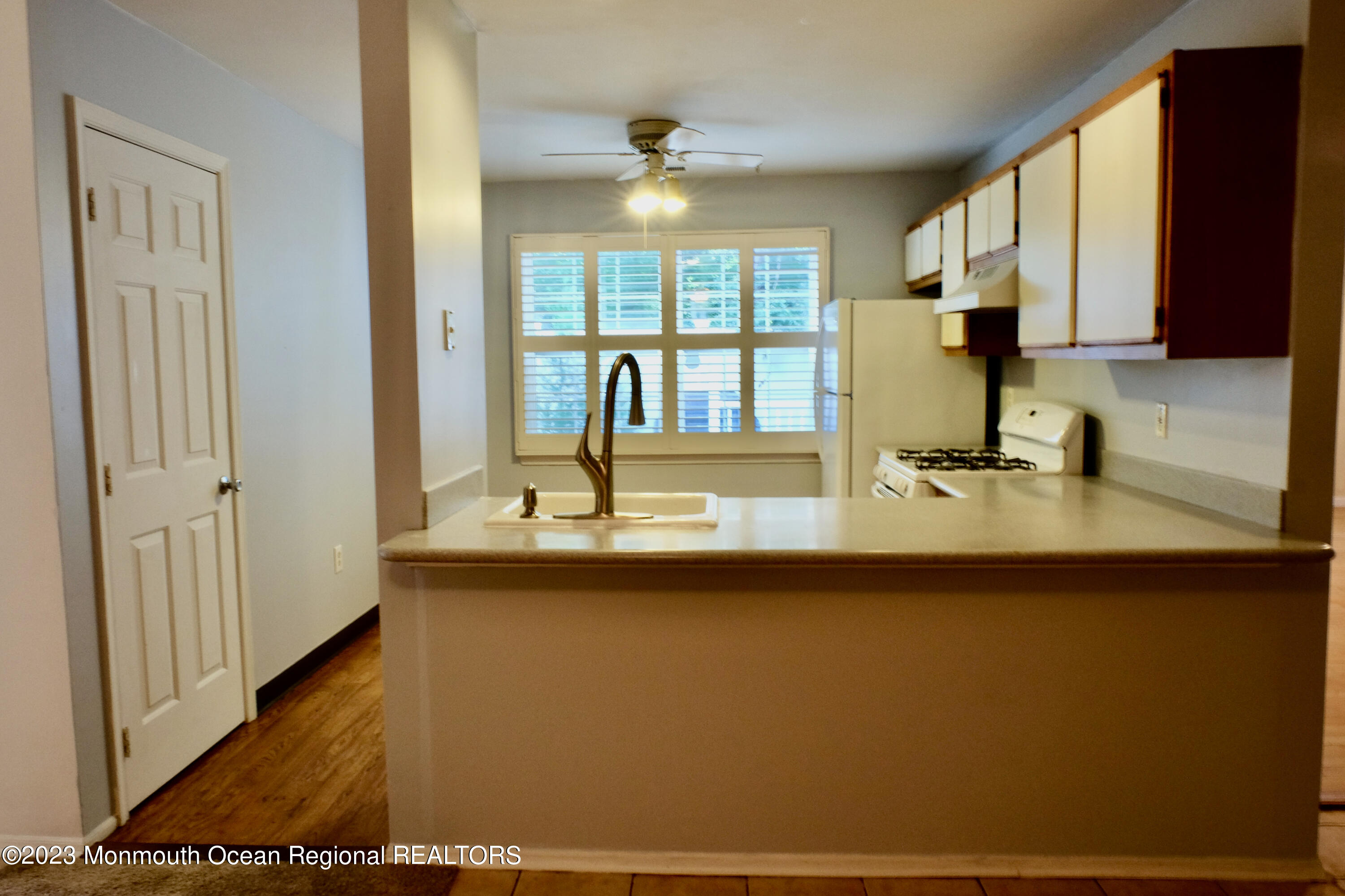 10 Commons Drive Neptune Township, NJ 07753 - Photo 13 of 21 a view of a kitchen with a sink and a window