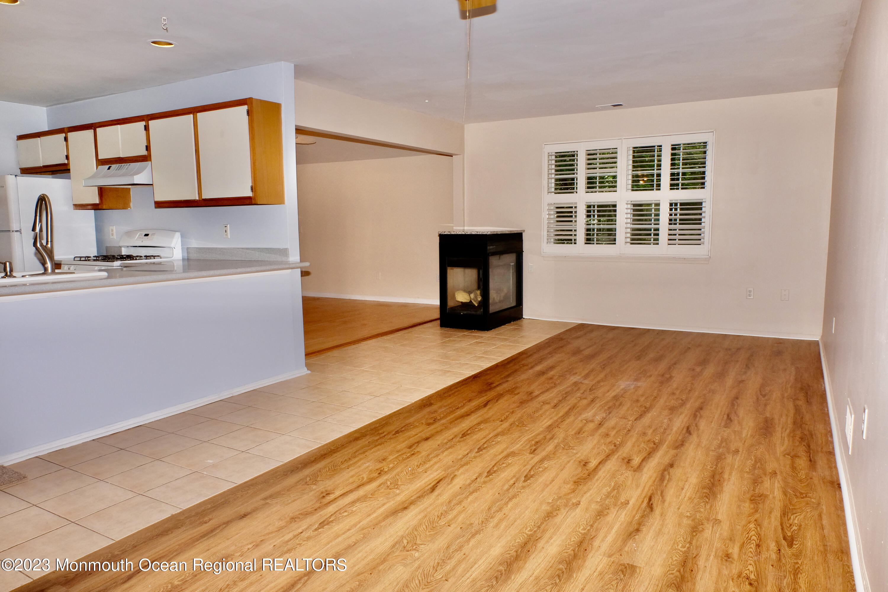 10 Commons Drive Neptune Township, NJ 07753 - Photo 6 of 21 a view of an empty room with a window