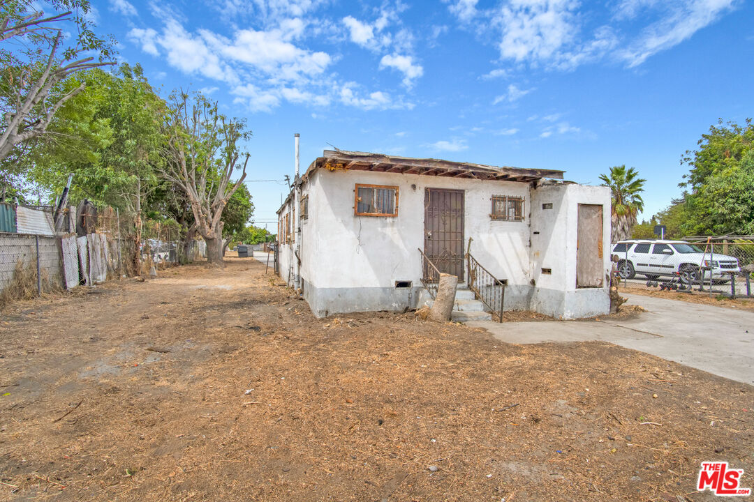 2028 East 126th Street Compton, CA 90222 - Photo 27 of 33 a view of a house with a yard
