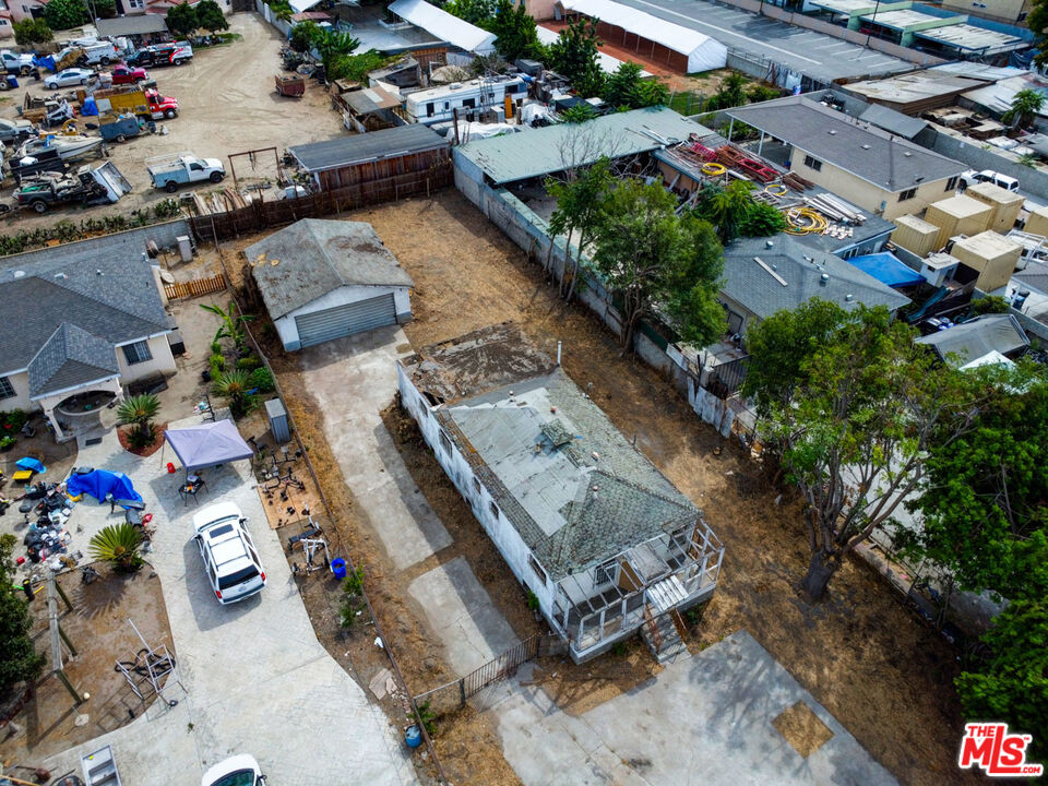2028 East 126th Street Compton, CA 90222 - Photo 5 of 33 an aerial view of a house with a yard and lake view