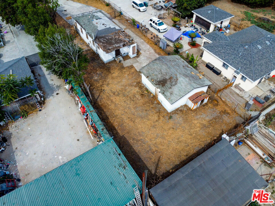 2028 East 126th Street Compton, CA 90222 - Photo 6 of 33 an aerial view of residential houses with outdoor space