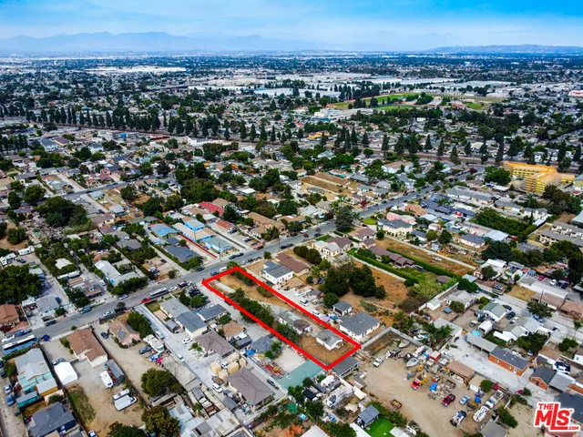 an aerial view of a city with lots of residential buildings