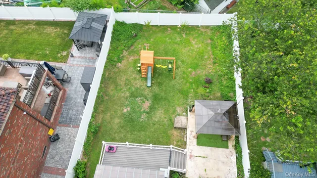 a balcony with wooden floor and furniture