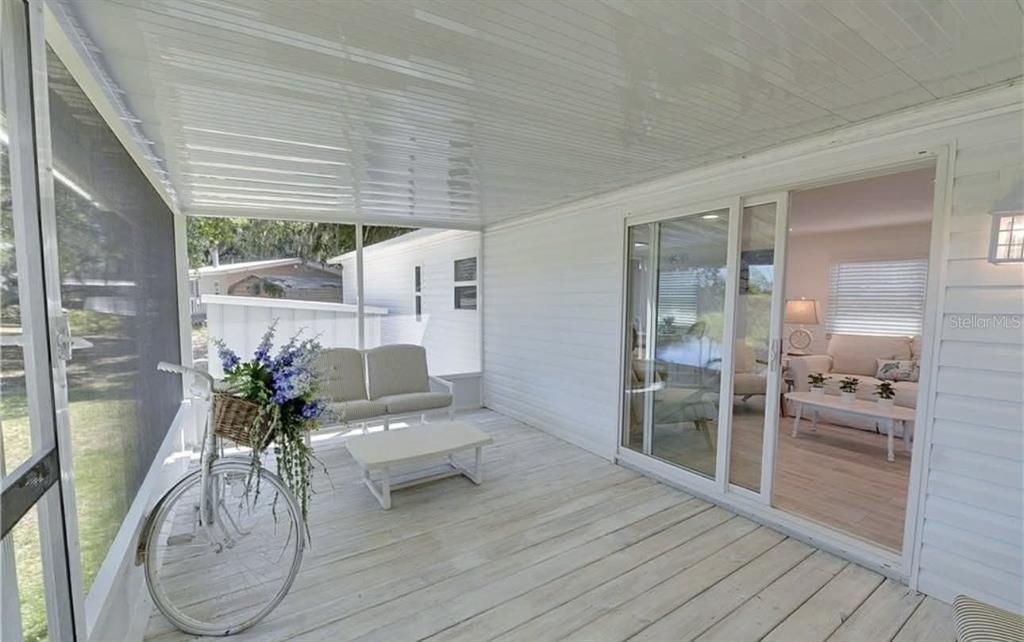 8164 East Turner Camp Road Inverness, FL 34453 - Photo 15 of 39 a view of a living room and a patio