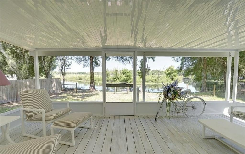 8164 East Turner Camp Road Inverness, FL 34453 - Photo 27 of 39 a view of a living room and a large window