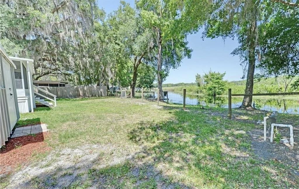 8164 East Turner Camp Road Inverness, FL 34453 - Photo 32 of 39 a view of a park with large trees