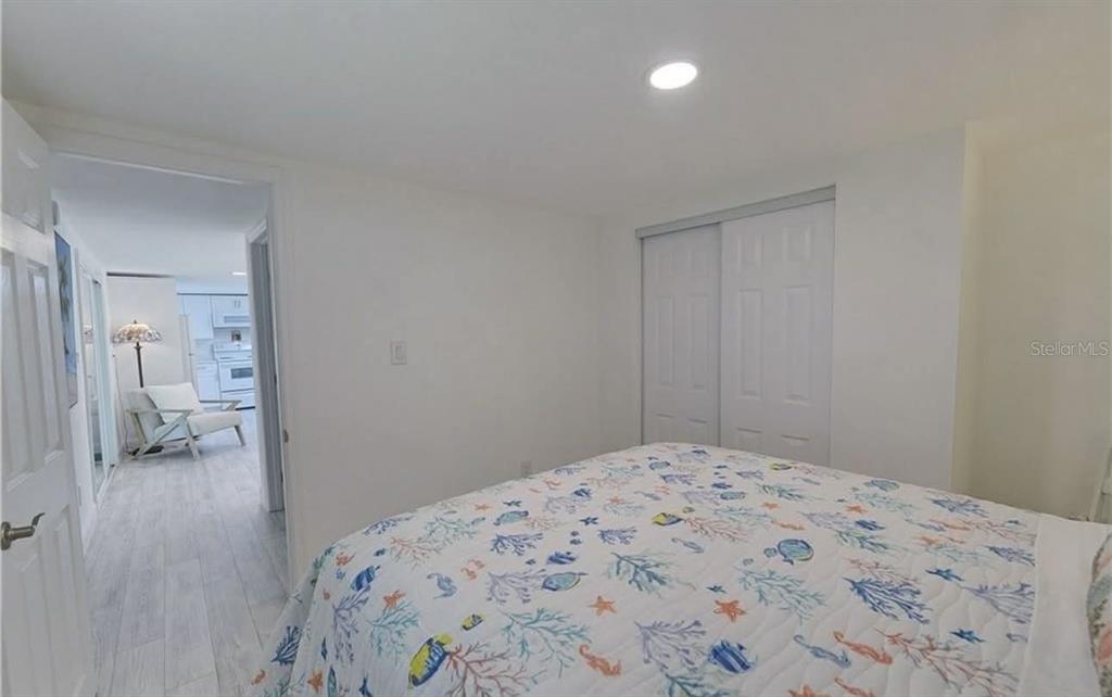 8164 East Turner Camp Road Inverness, FL 34453 - Photo 7 of 39 a bedroom with a bed and a view of bathroom