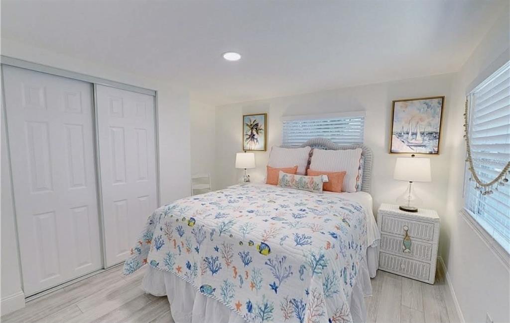 8164 East Turner Camp Road Inverness, FL 34453 - Photo 8 of 39 a bedroom with a bed and a window