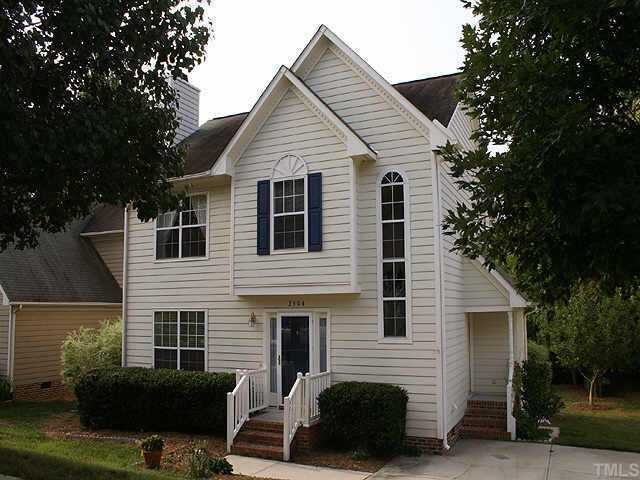2504 Constitution Drive Raleigh, NC 27615 - Photo 1 of 9 a view of a house with a chairs in patio