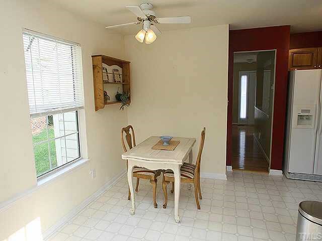 2504 Constitution Drive Raleigh, NC 27615 - Photo 5 of 9 a dining room with furniture and window