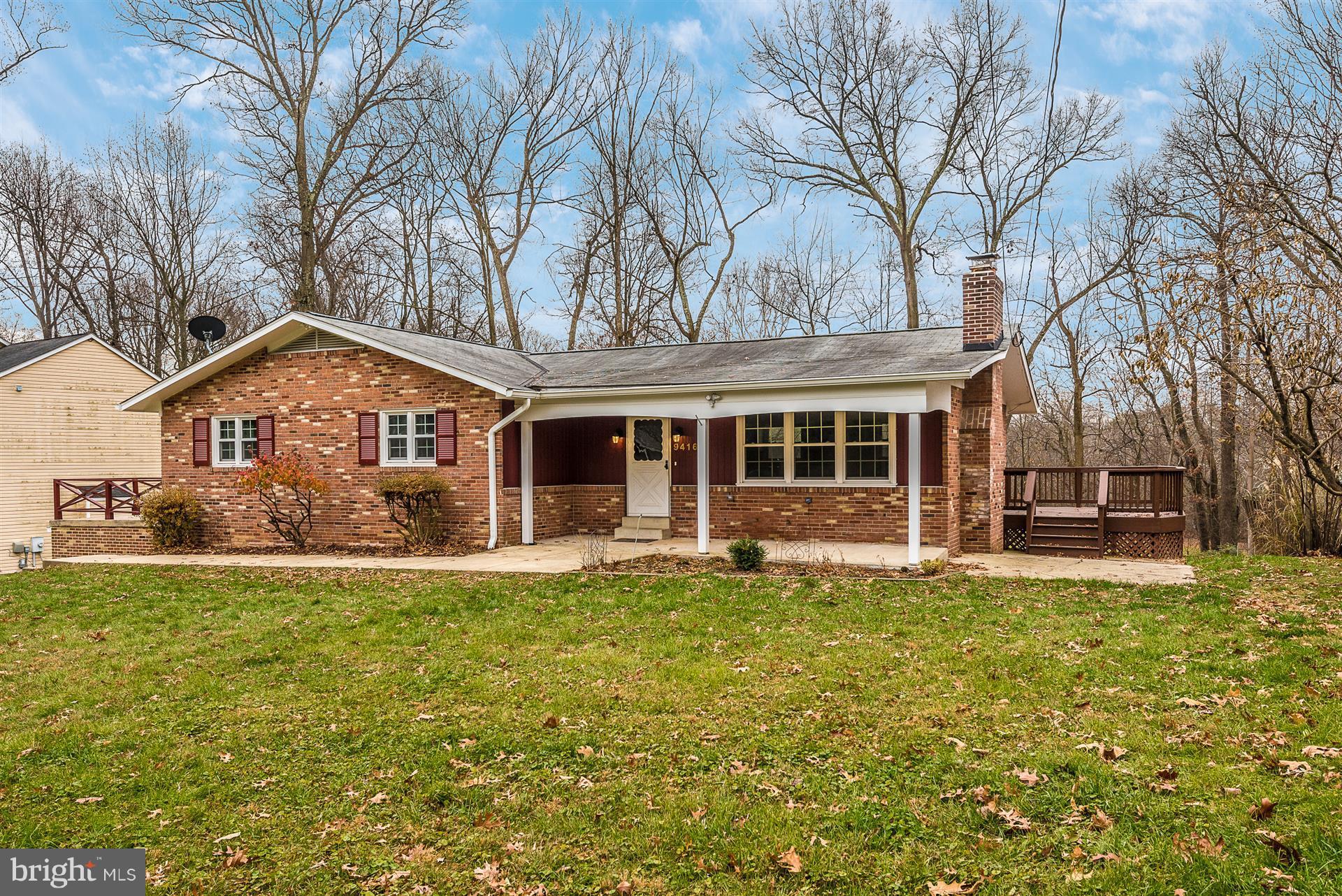 9416 Emory Grove Road Gaithersburg, MD 20877 - Photo 2 of 30 a front view of a house with a yard