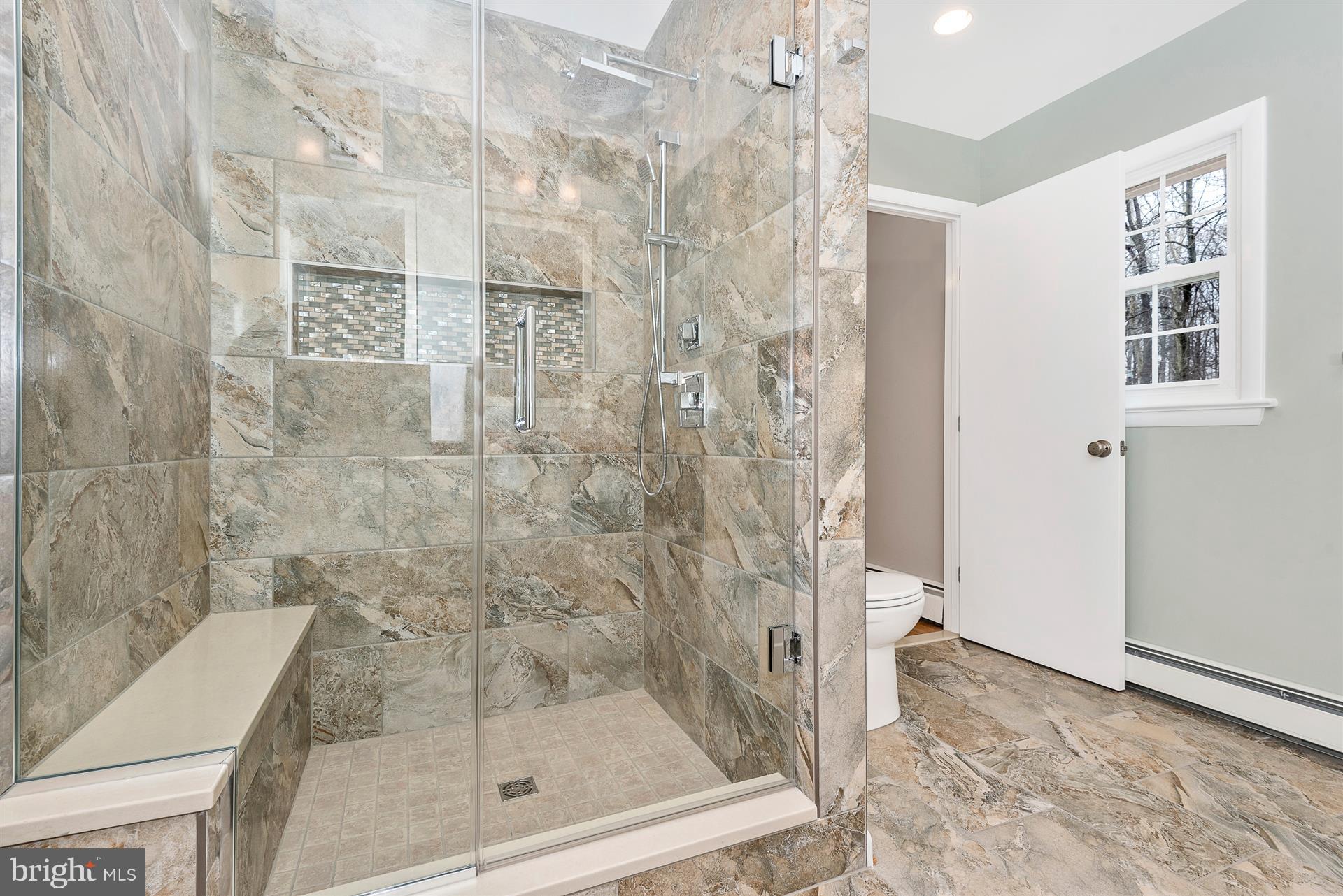 9416 Emory Grove Road Gaithersburg, MD 20877 - Photo 24 of 30 a bathroom with a shower