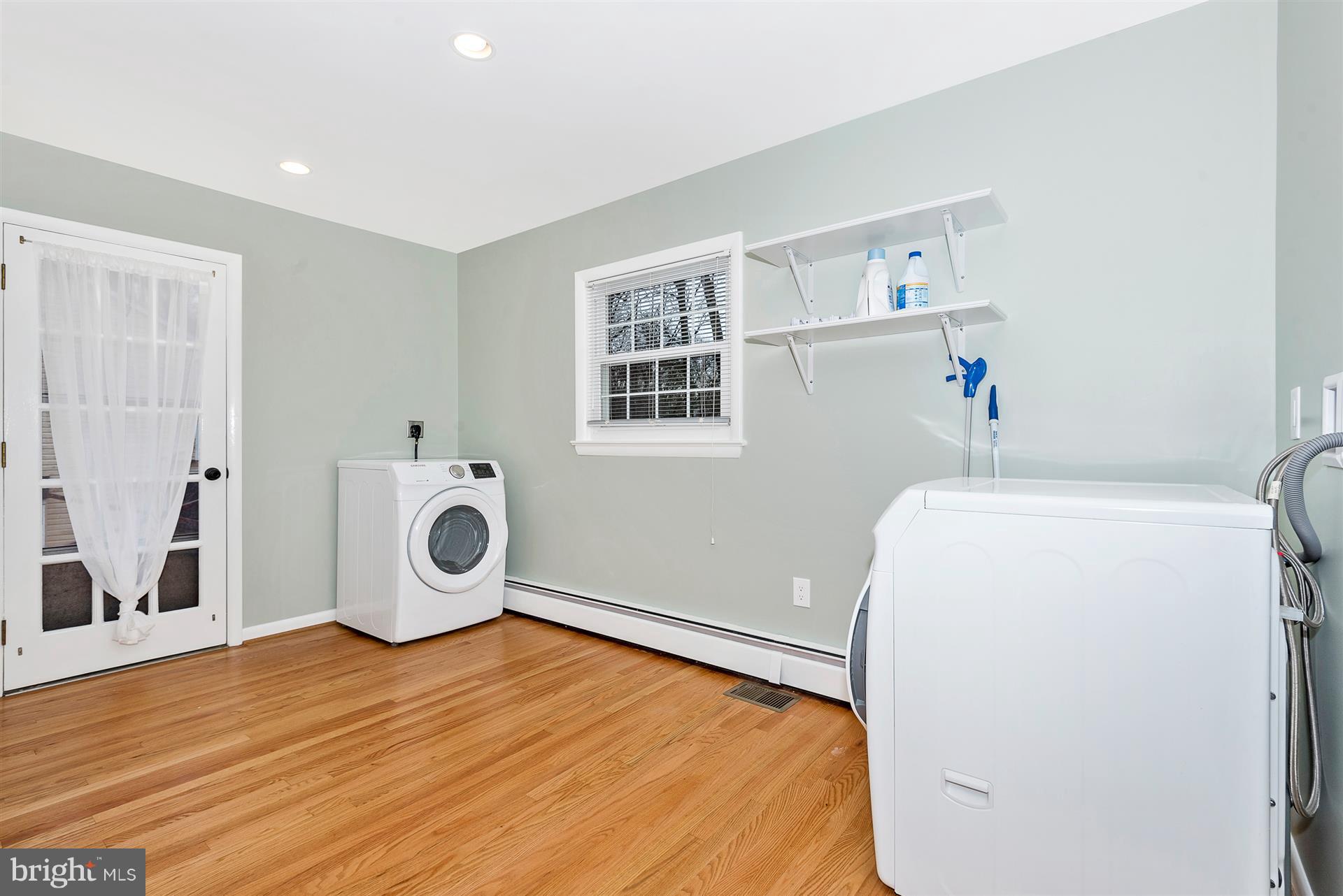 9416 Emory Grove Road Gaithersburg, MD 20877 - Photo 29 of 30 a view of a storage & utility room with a washer dryer