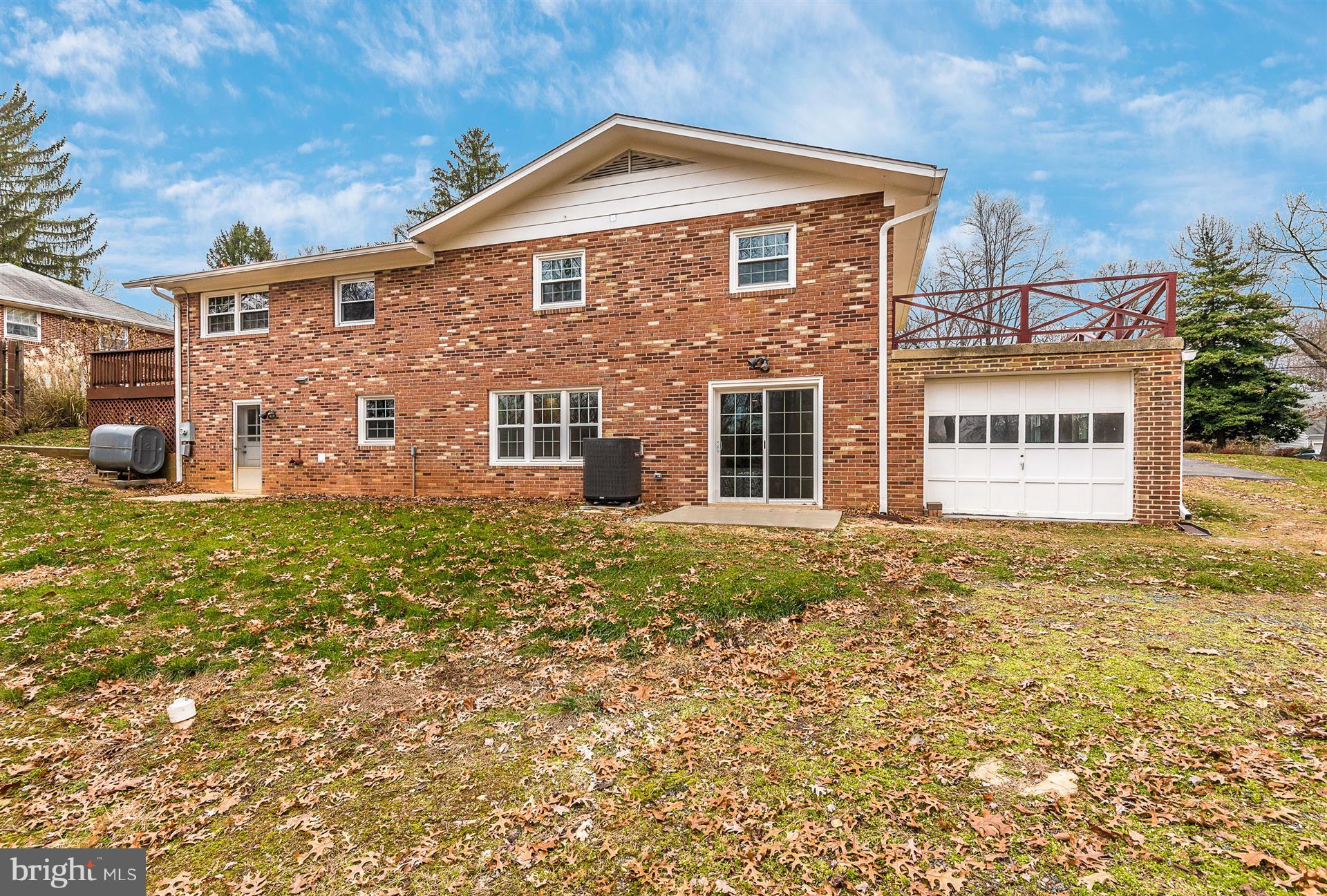 9416 Emory Grove Road Gaithersburg, MD 20877 - Photo 5 of 30 a front view of a house with garden