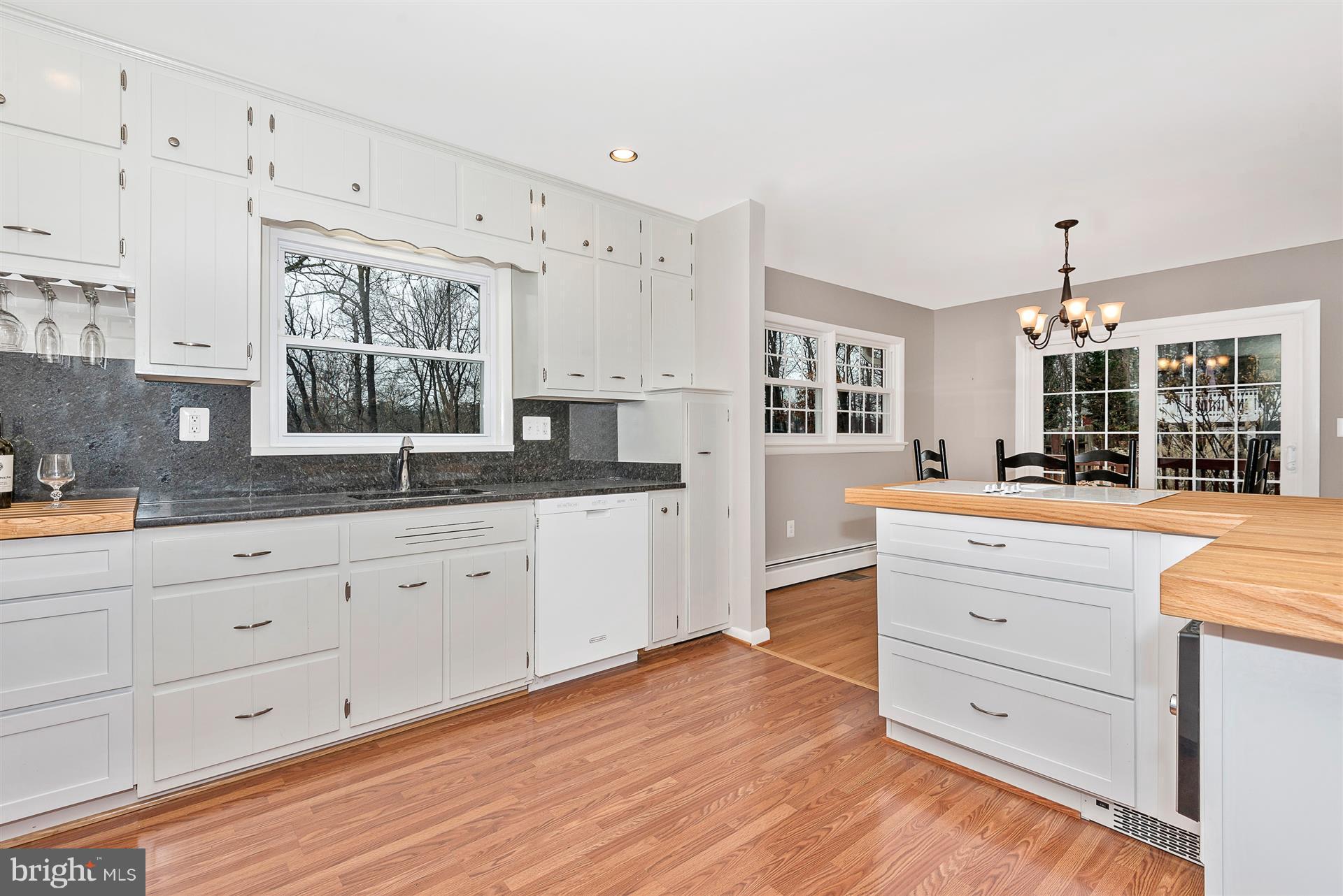 9416 Emory Grove Road Gaithersburg, MD 20877 - Photo 10 of 30 a spacious bathroom with a granite countertop sink mirror and