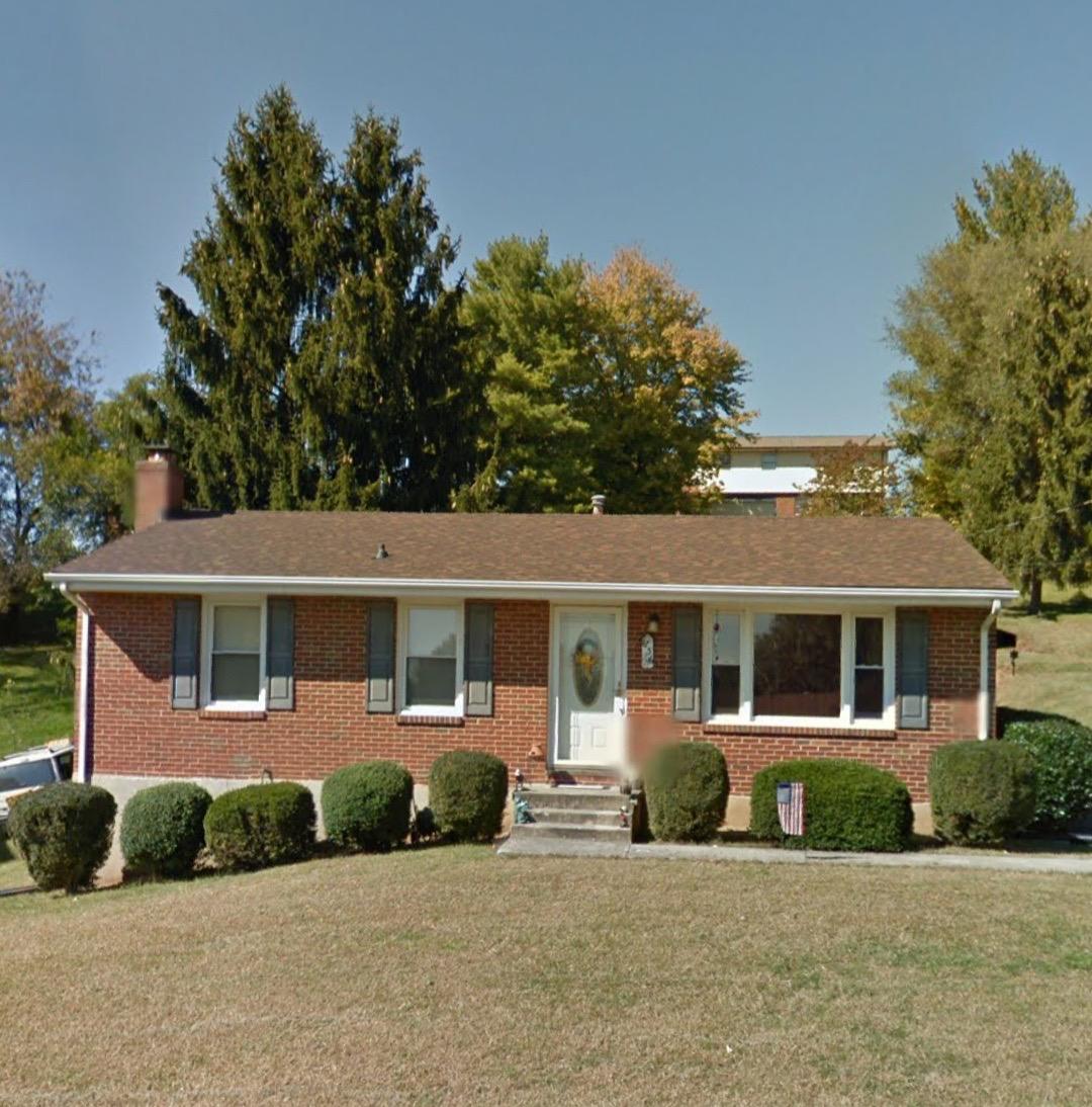 front view of a house with a street