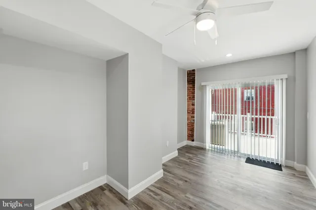 a view of entryway with wooden floor