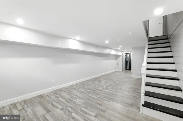 a view of entryway with wooden floor