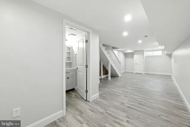 a view of entryway with wooden floor