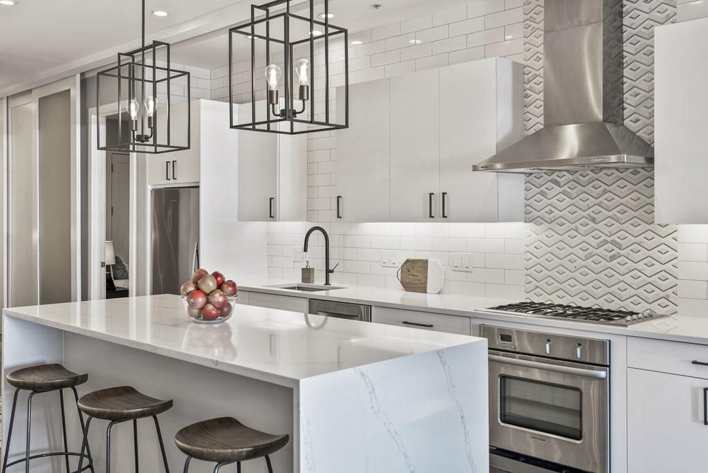 36 A, Unit 5E Boston, MA 02127 - Photo 2 of 38 a kitchen with stainless steel appliances a sink and cabinets