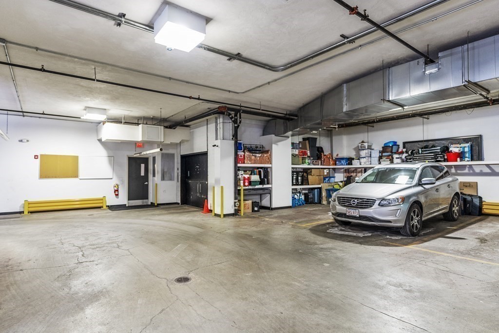 36 A, Unit 5E Boston, MA 02127 - Photo 36 of 38 a view of parking garage with cars