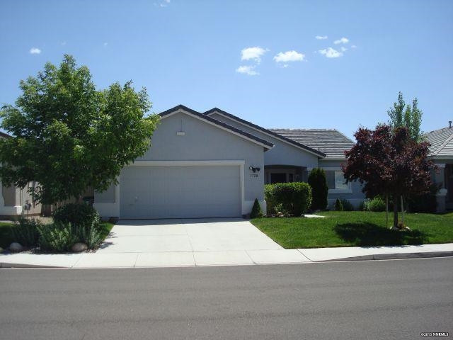 1720 Trek Trail Reno, NV 89521 - Photo 1 of 1 a house that has a lot of windows in it