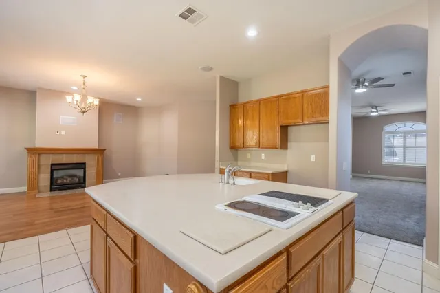 a kitchen with a stove and a sink