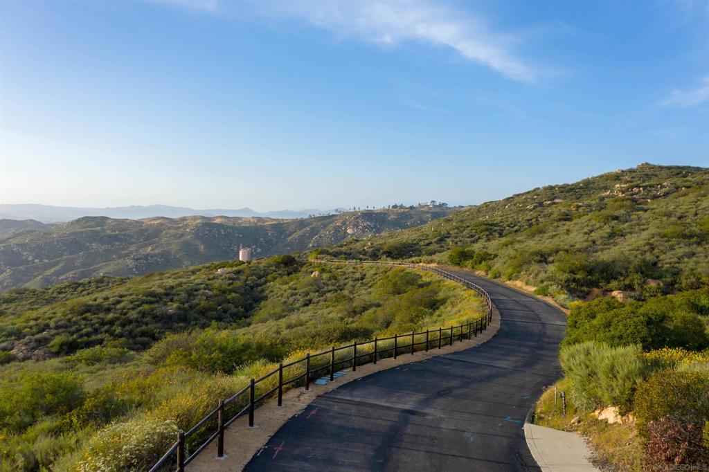 18035 Sunset Point Poway, CA 92064 - Photo 3 of 62 a view of a forest with mountains in the background