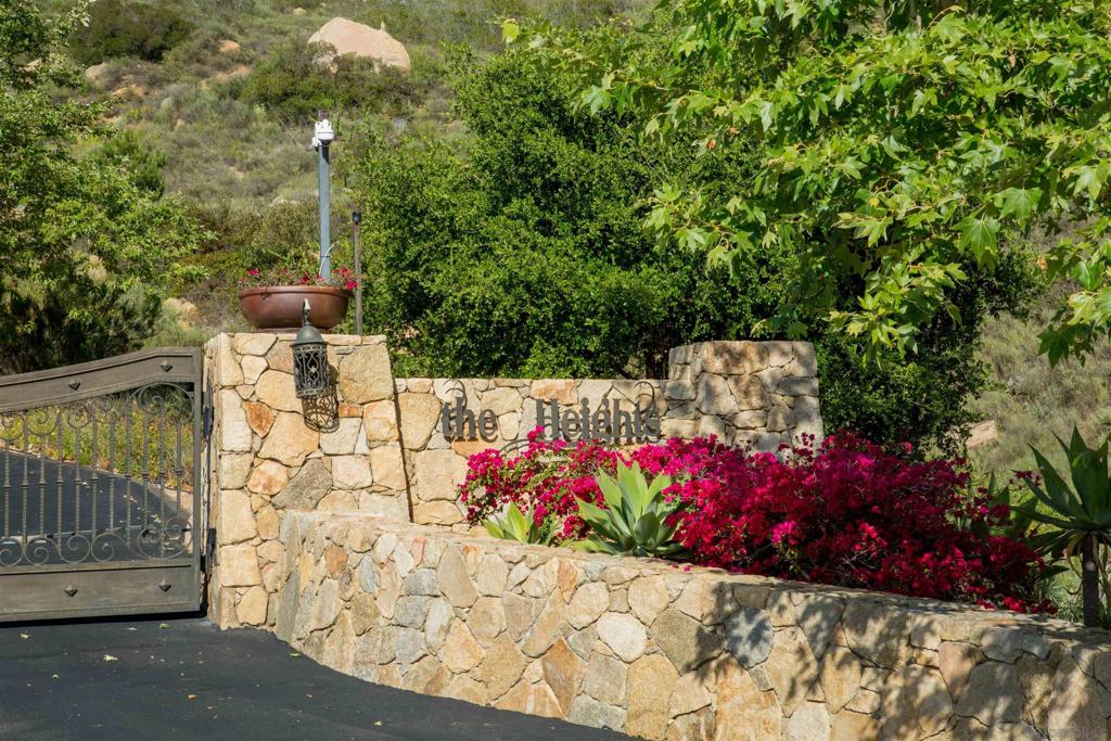 18035 Sunset Point Poway, CA 92064 - Photo 51 of 62 a view of a wooden house with a flower garden