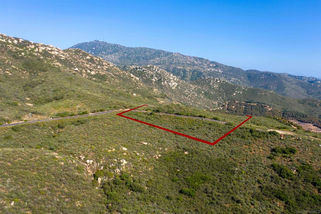 18035 Sunset Point Poway, CA 92064 - Photo 56 of 62 a view of a mountain with a yard