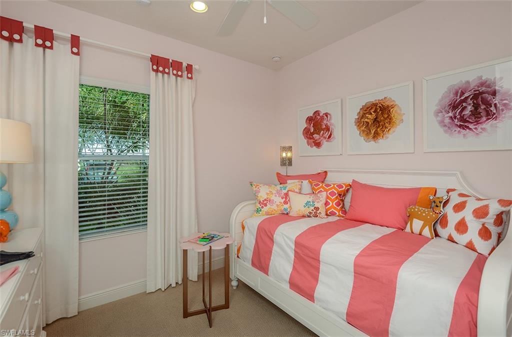 4665 Centaurus Circle Naples, FL 34120 - Photo 11 of 16 a bedroom with a bed and a window
