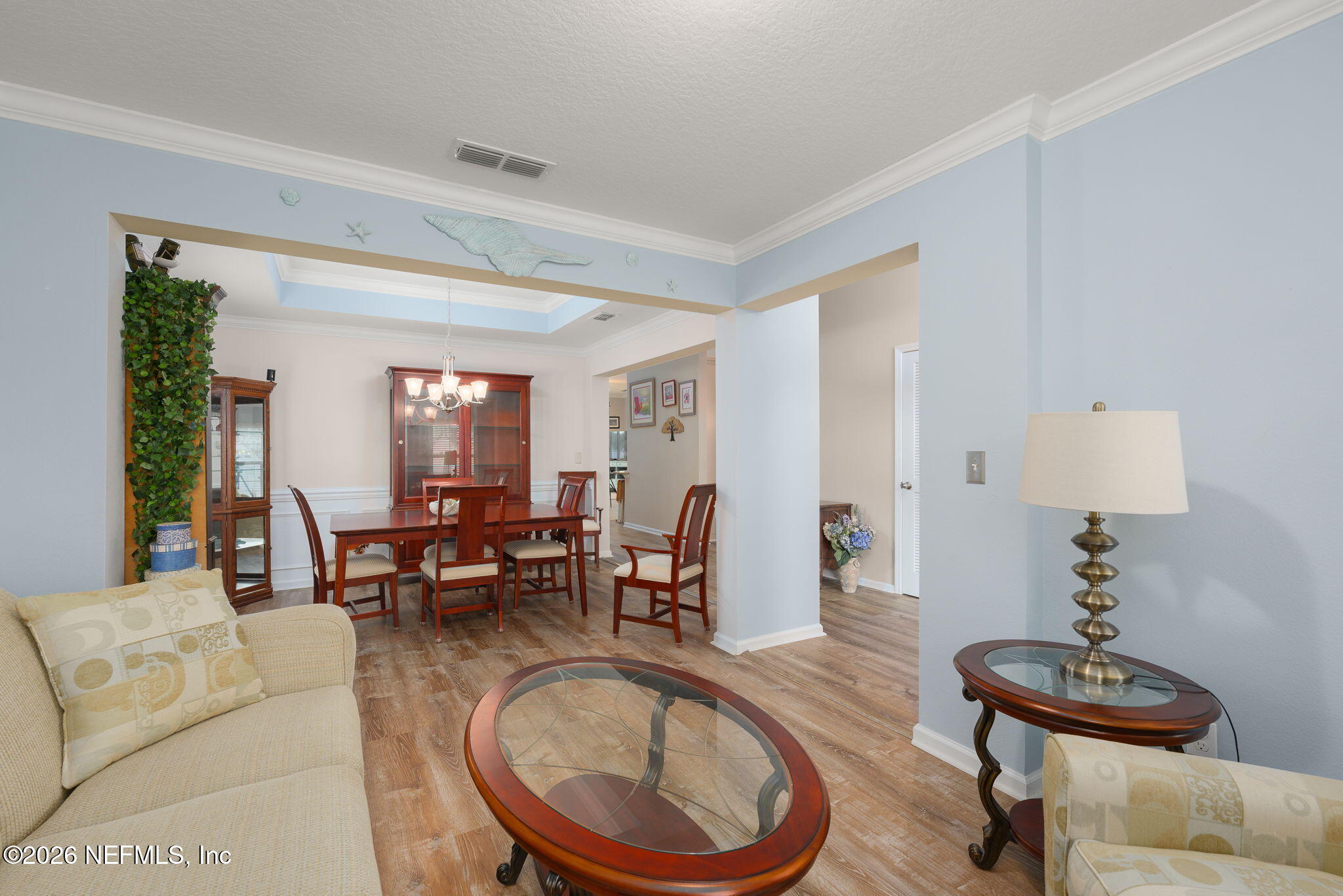 405 Porta Rosa Circle St. Augustine, FL 32092 - Photo 11 of 55 a living room with furniture a rug and a large window