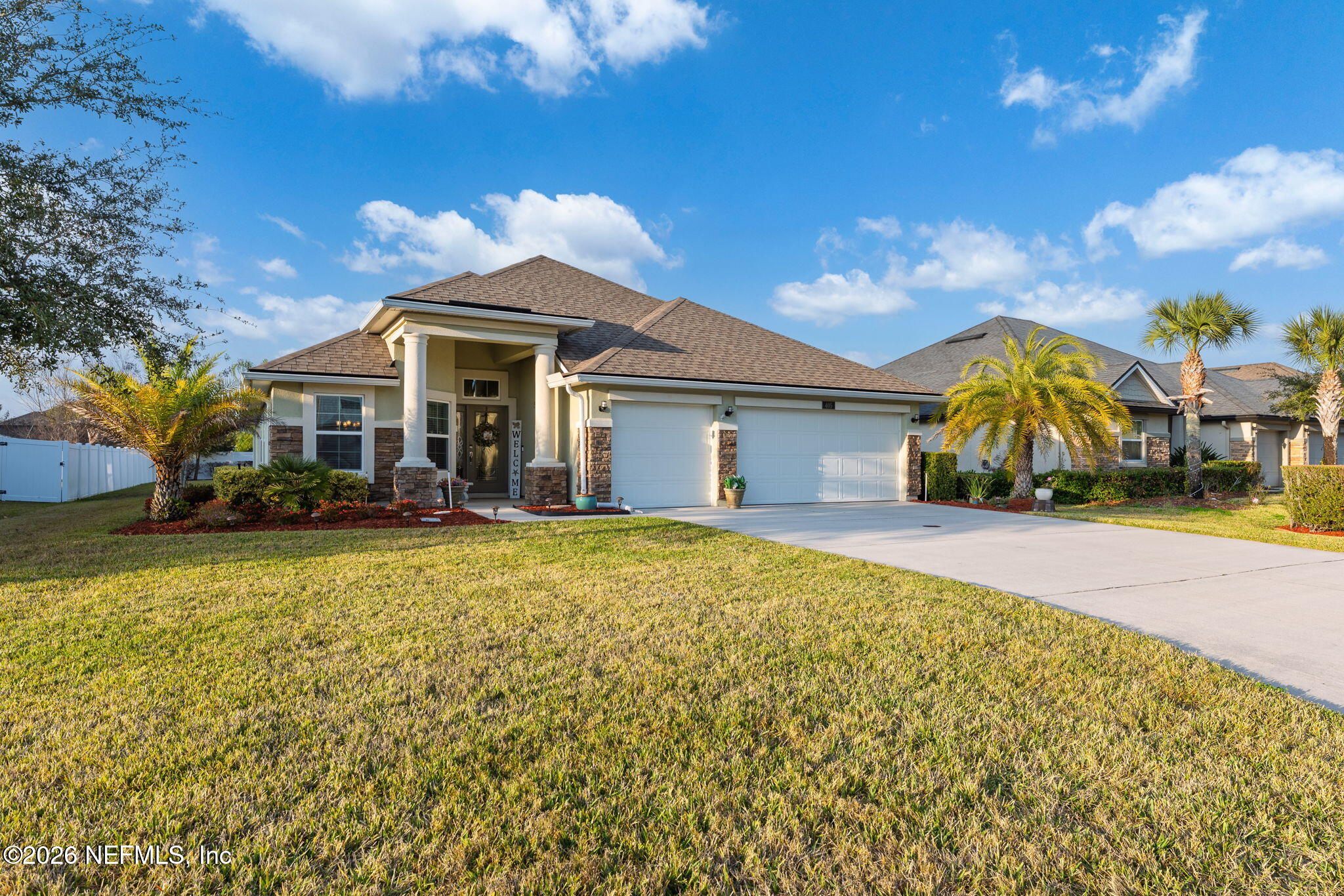 405 Porta Rosa Circle St. Augustine, FL 32092 - Photo 2 of 55 a view of a house with a yard