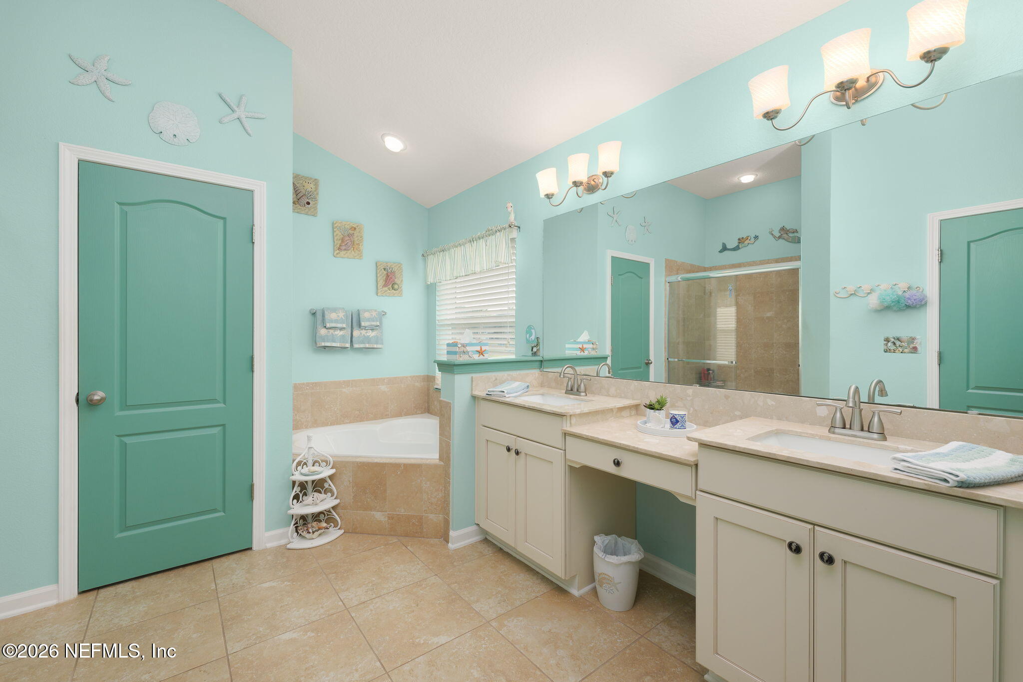 405 Porta Rosa Circle St. Augustine, FL 32092 - Photo 22 of 55 a spacious bathroom with a granite countertop sink mirror and a
