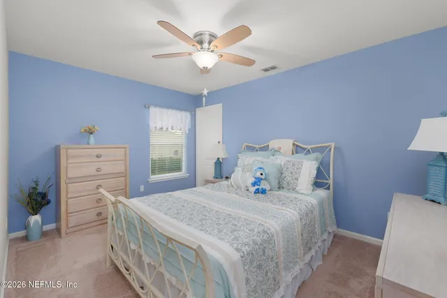 a room with furniture and wooden floor